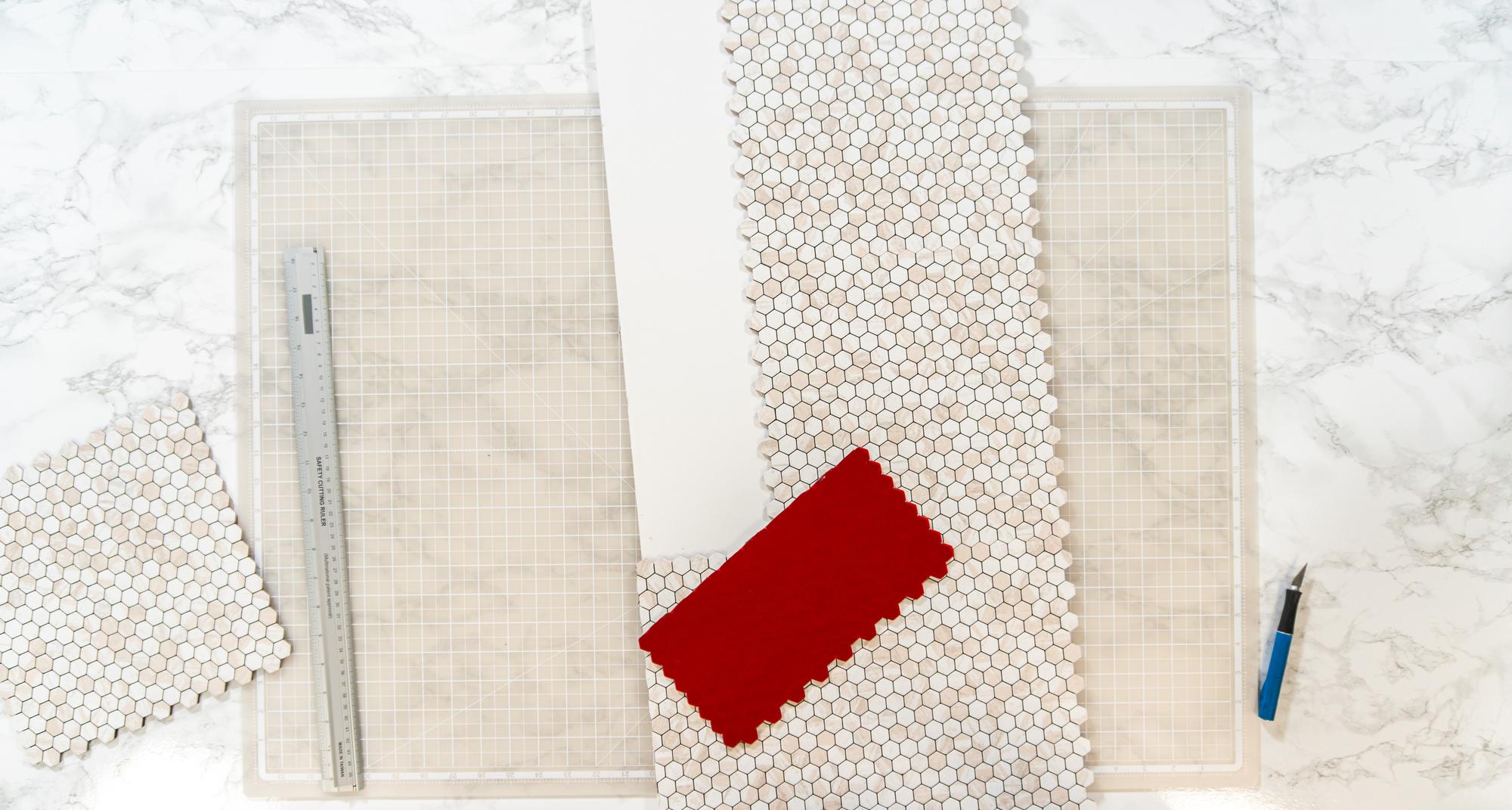 stack of embroidered swatches with labels